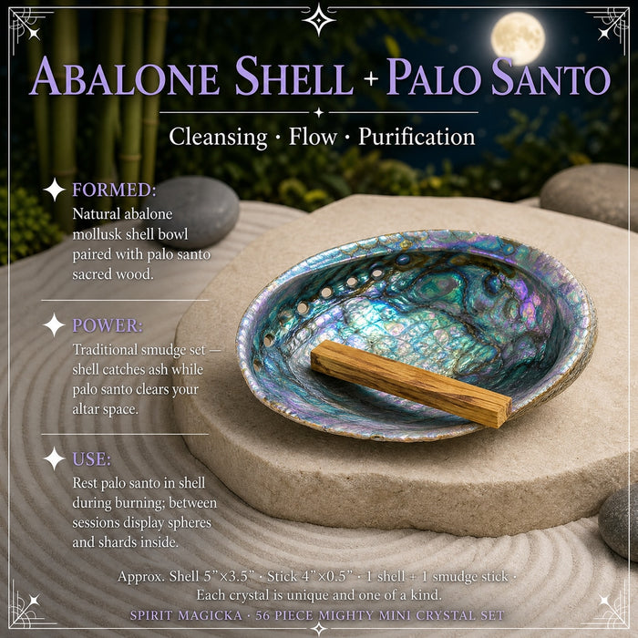 Iridescent abalone shell with a palo santo stick resting across it